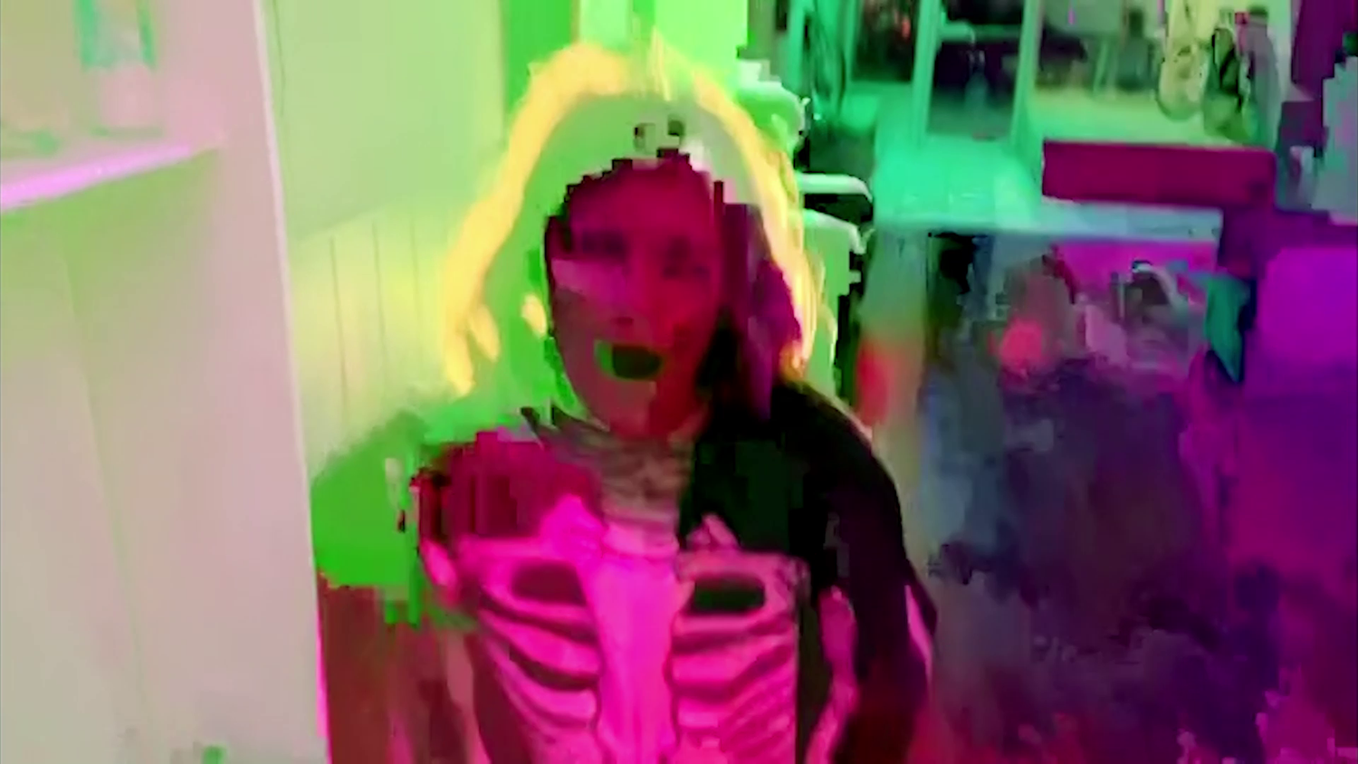 Distorted image of Rachel wearing a skeleton costume in It Doesn't Get Any Better Than This